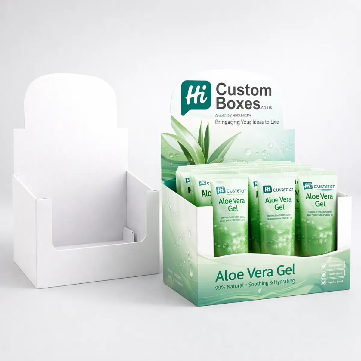 A white cardboard counter display unit next to a branded green version filled with gel tubes. class=